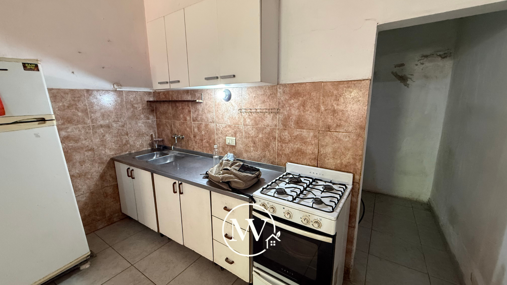 Casa Apta Credito en San Benito. 2 Dorm, fondo y cochera.